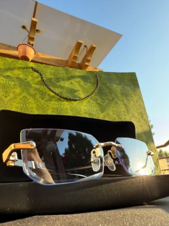 Luxury Rimless Blue-Tint Sunglasses with Gold Detailing